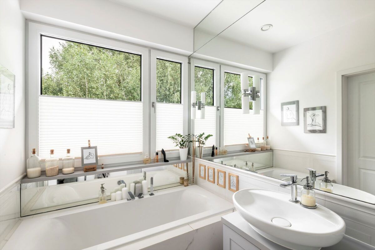 Bathroom with large window.