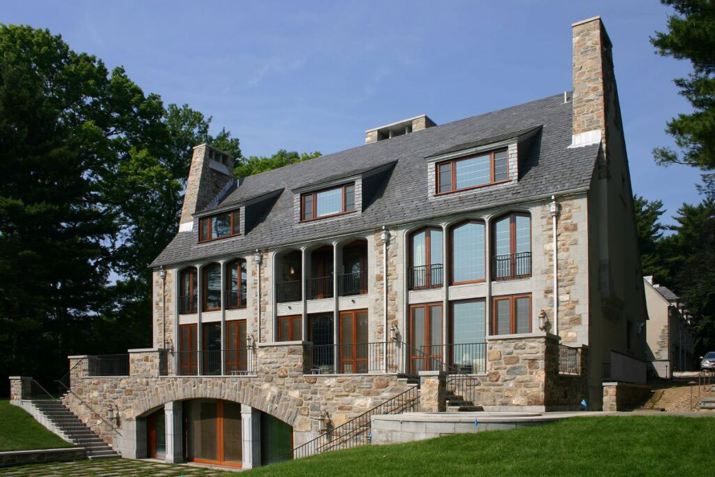 Wooden windows with a unique shape in a traditional building.