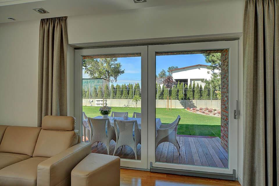 White tilt and slide door in the living room.