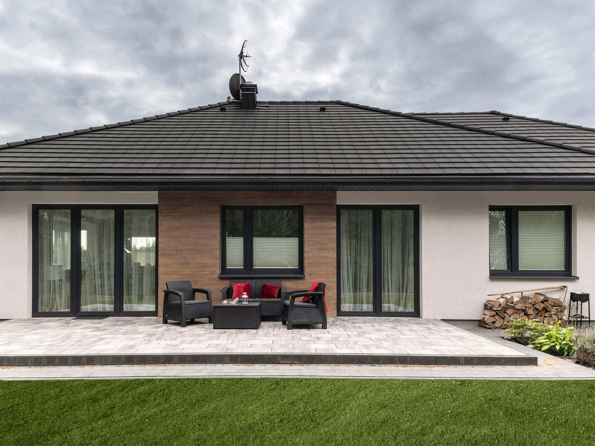 Black windows and terrace door.