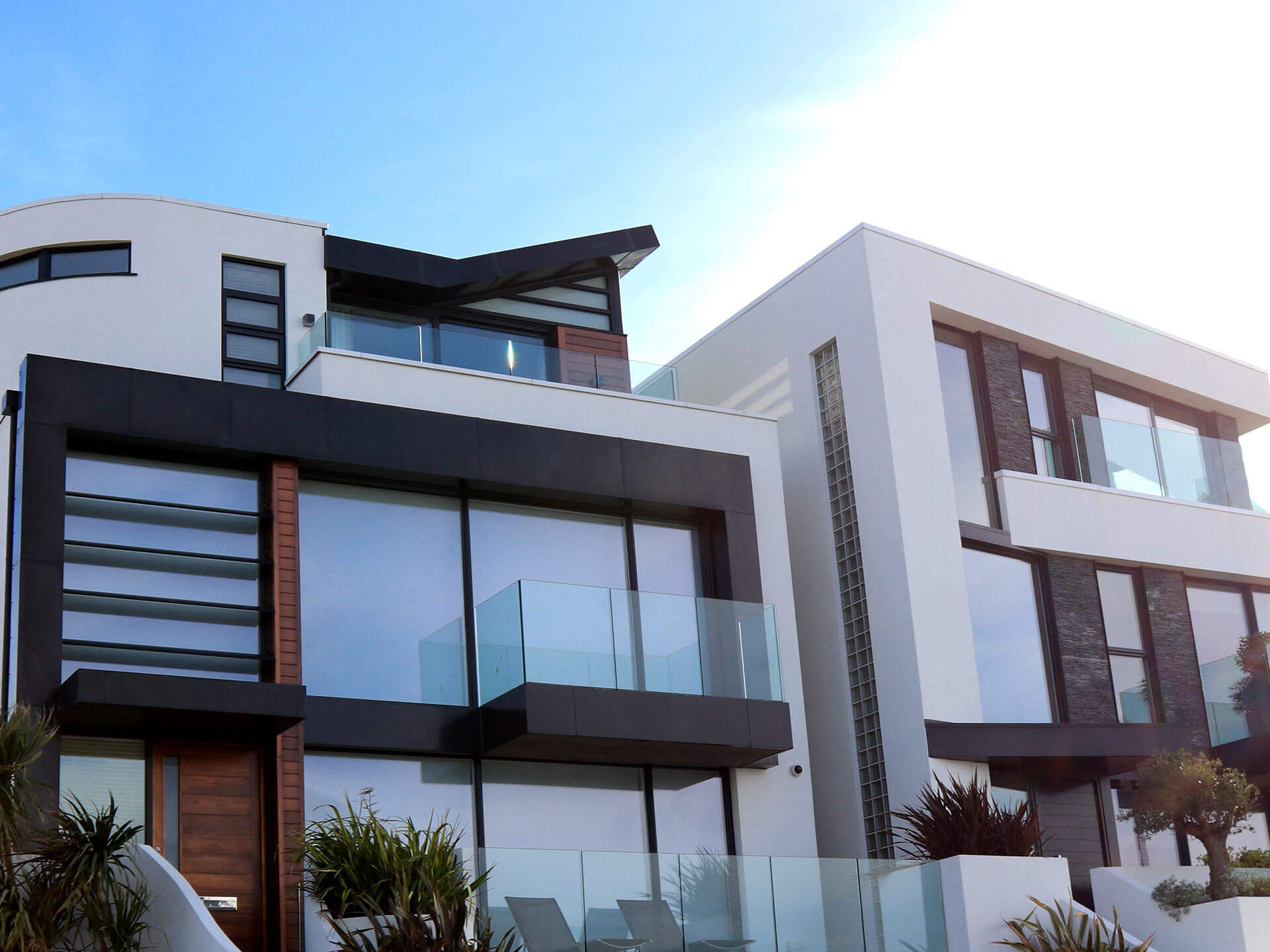 Large wooden windows with aluminium cladding.