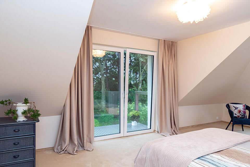 White window in the bedroom.