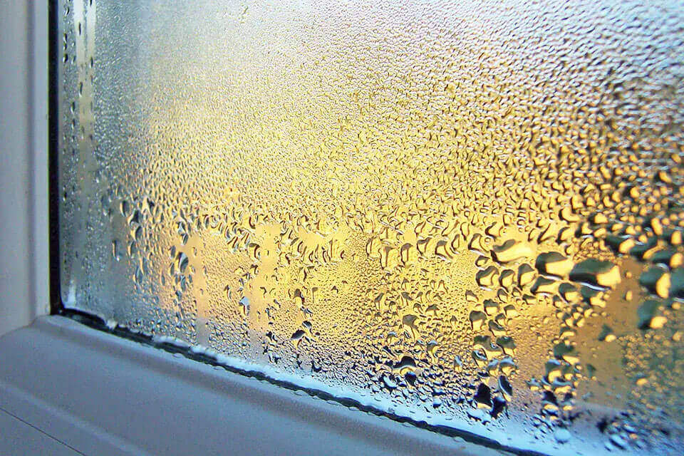 Mist on the inside of the glass.