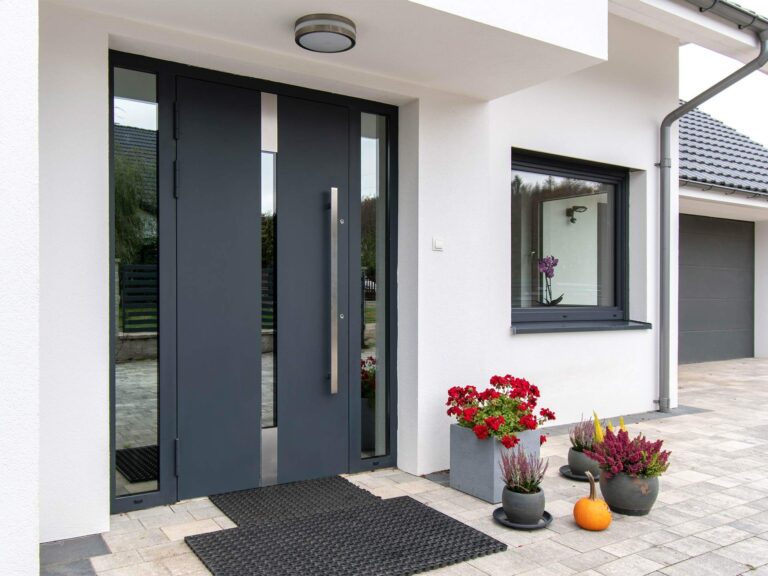 Modern door with a handrail