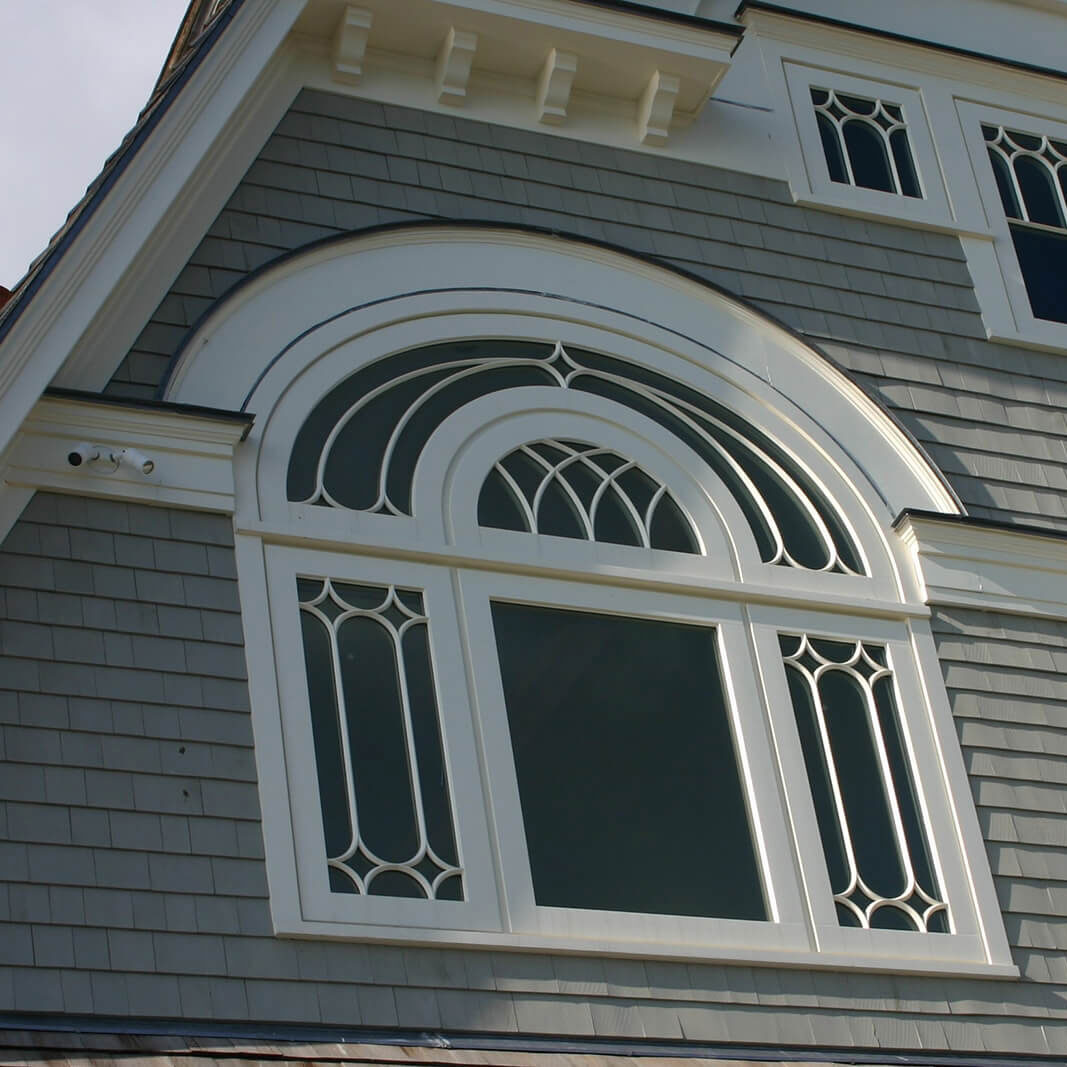 White arched wooden window