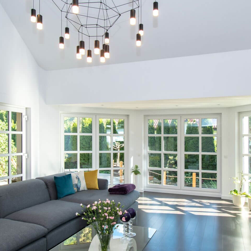 Large white windows in the living room.