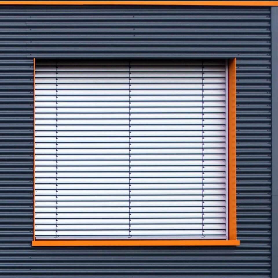 Building with facade blinds.